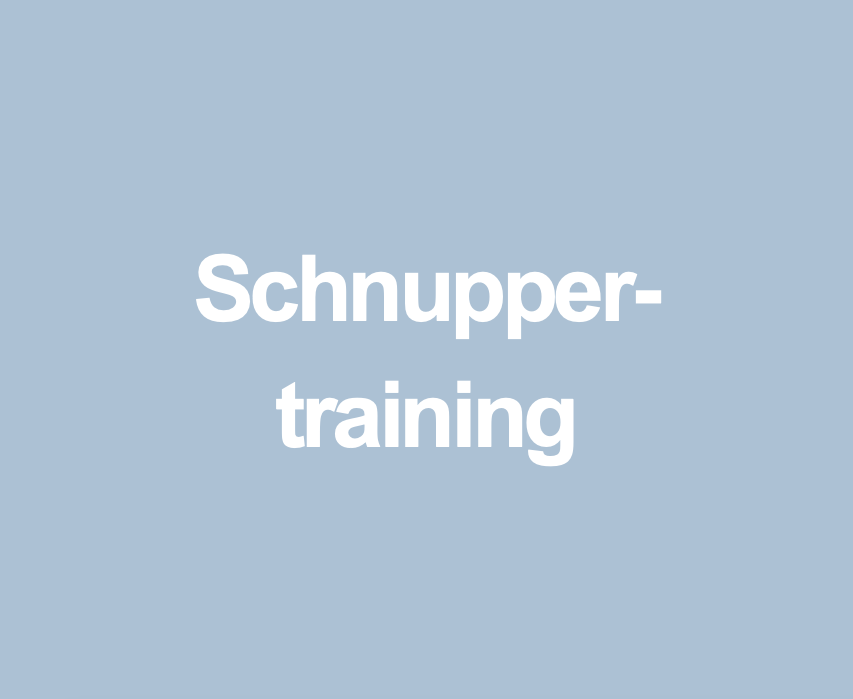 Schriftzug Schnuppertraining auf blauem Hintergrund